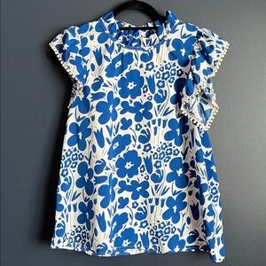 THML Women’s Blouse Top with Blue Floral Design; ruffled neck; Pom detail